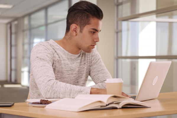 man working at laptop