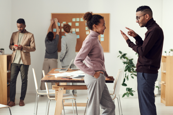 people talking in office