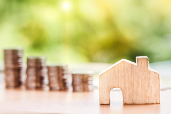 image of house with money in background