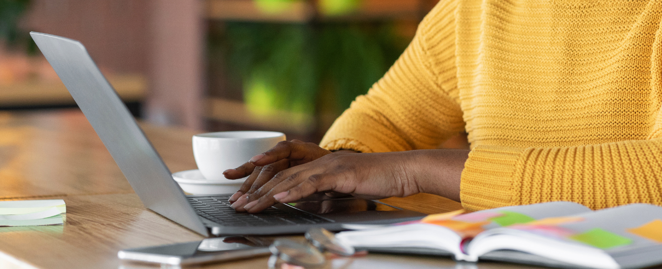 Person typing on laptop